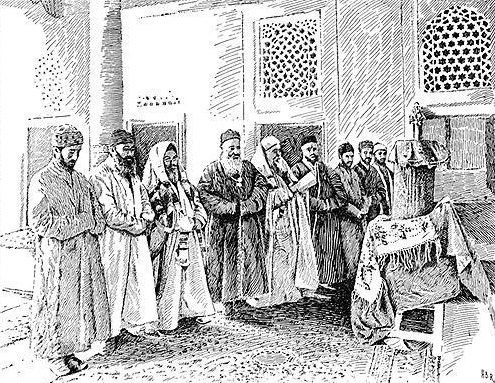 A nineteenth-century engraving of Bukharan Jewish men in robes and headgear gathered in a synagogue, used here as contextual evidence for the community whose dress and textile culture the article follows.